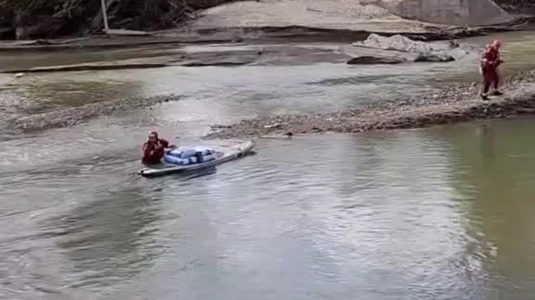 They have to use kayaks to deliver bales of hay to stranded horses so they don't starve