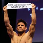 Henry Cejudo breaks fortune cookie, reveals fight prediction before final staredown with Song Yadong